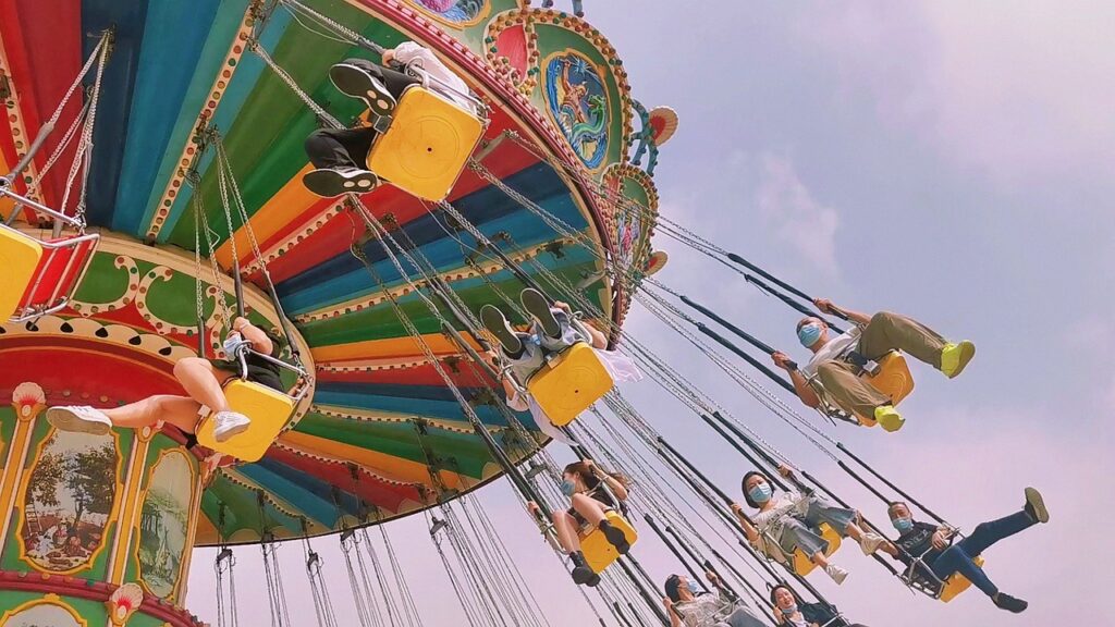 swings at a fair, festival amusement park