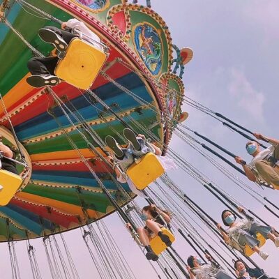 swings at a fair, festival amusement park